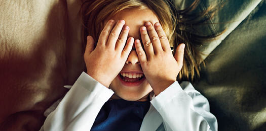 Kid Playing Hide Seek Smiling Concept